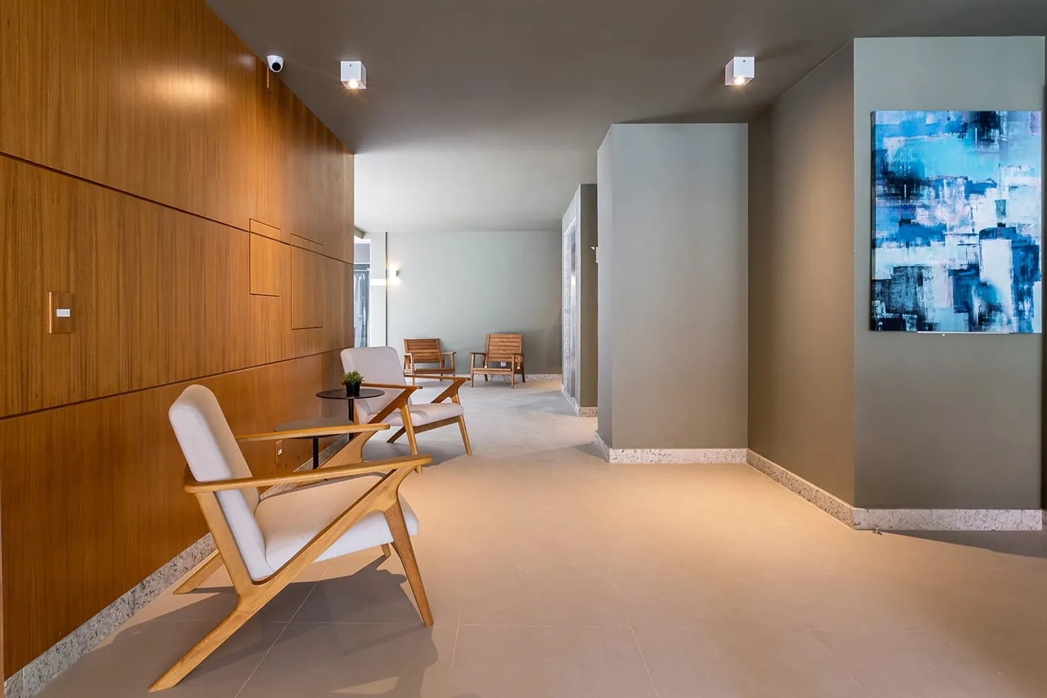 Edifício Di Iulio Urca, apartamento de 3 quartos com sala ampla e iluminação natural.
