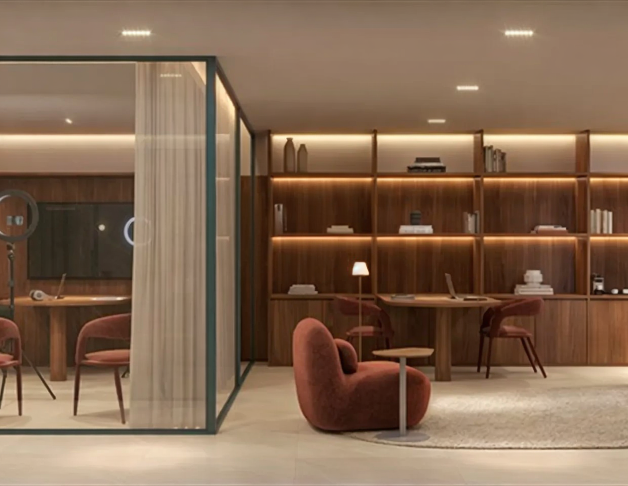 Quarto e sala compactos e mobiliados com design contemporâneo no ORA Studios Centro Rio de Janeiro.