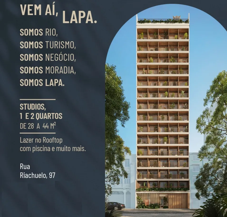 Entrada principal do Somos Lapa Residencial exibindo arquitetura contemporânea e iluminação integrada.