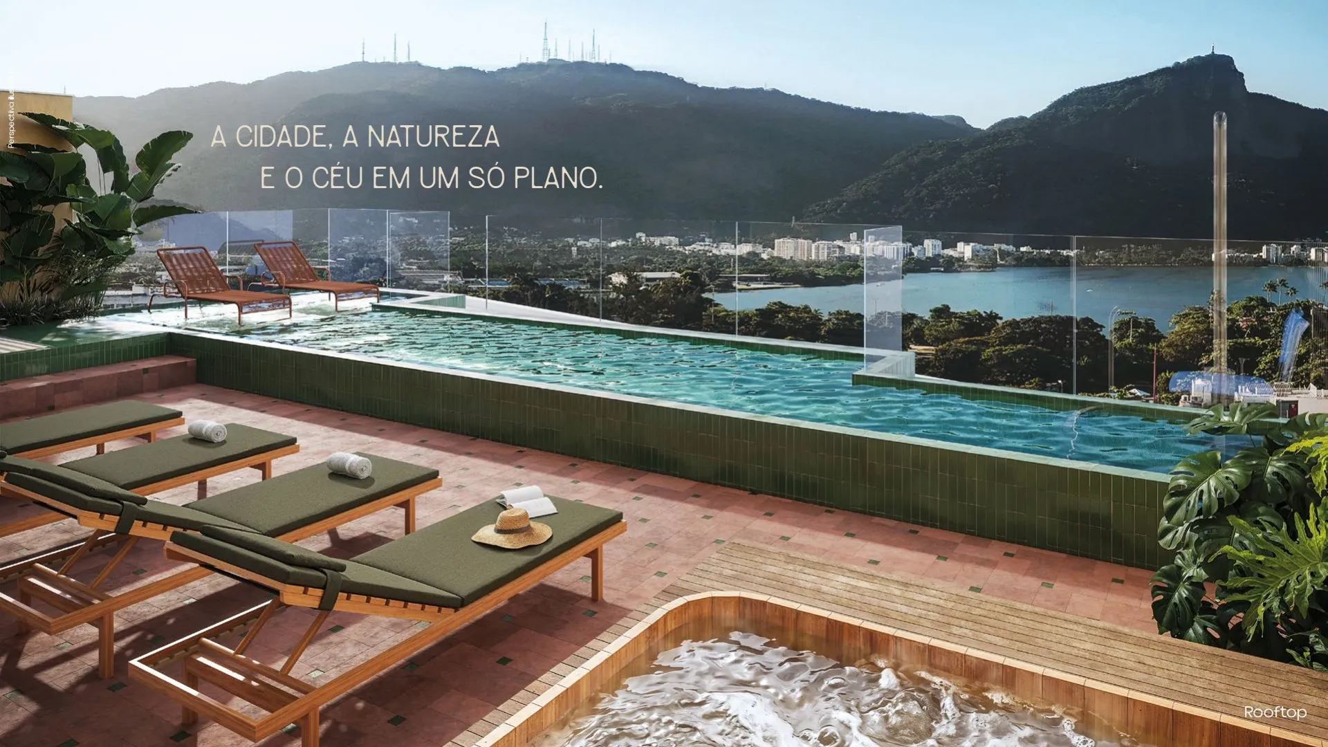 Parque Studios Ipanema: cozinha americana com bancada em granito, cooktop e armários planejados.